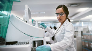 Scientist running a test with equipment